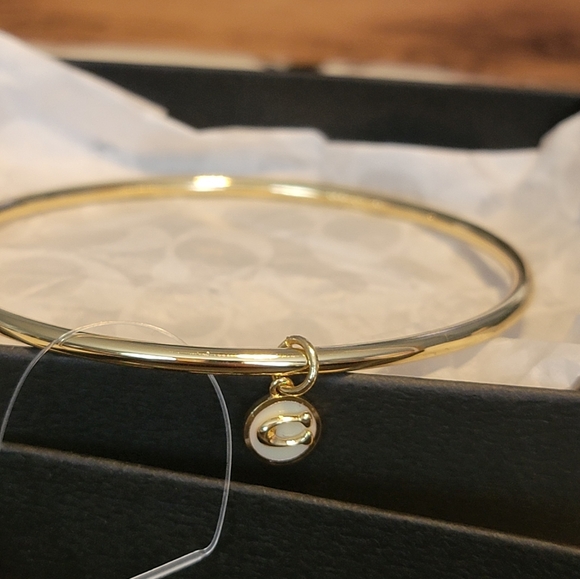 Coach Goldtone Bangle White/Gold C Charm NWOT includes box and coach wrapping - Picture 1 of 6